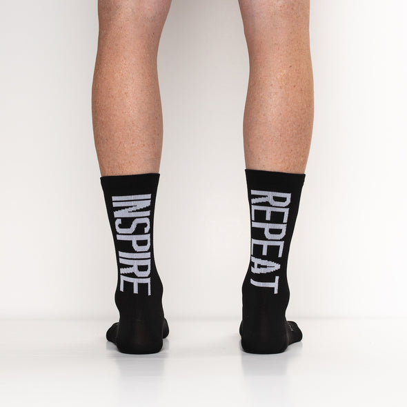 Inspirational cycling socks in classic black