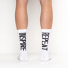 Lightweight cycling socks in classic white with inspirational quote